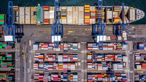 Aerial top view 4K Time lapse of container cargo ship in import export. Stock Footage