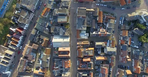 Aerial top view above roofs of the houses in Netherlands Stock Footage