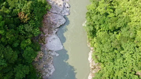 Aerial top view of a beautiful mountain river with a granite rockbed Stock Footage 169927853