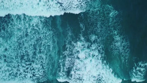 Aerial top view beautiful texture of big power dark ocean waves with white wash Stock Footage 287106439