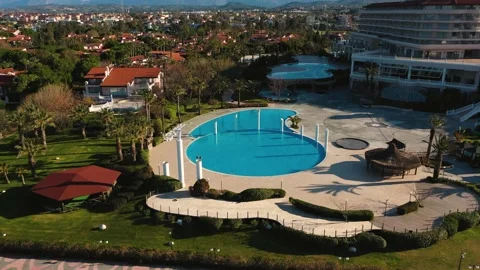 Aerial top view of  blue pool in a luxury resort. Turkey 2019 Stock Footage 133278093