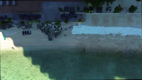 Aerial top view of a boy playing Stock Footage 258336816