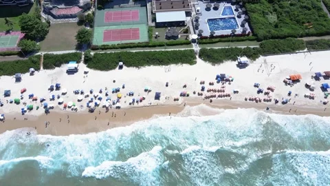 Aerial top view of Brava Beach in Florianopolis sand crowded with people Stock Footage 317726133