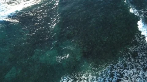 Aerial top of view of breaking waves, Martinique Stock Footage 82657252