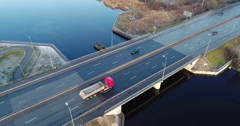 Aerial top view of bridge road automobile traffic of many cars. 動画素材 84046357