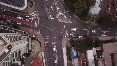 Aerial top view of a busy intersection with traffic - 4K Stock Footage 85322026