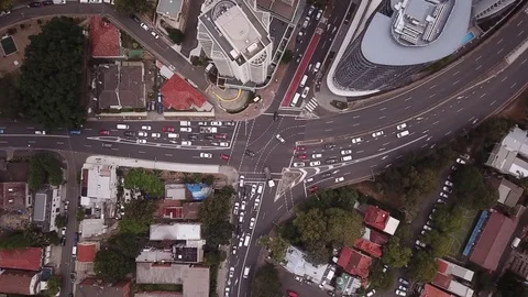 Aerial top view of a busy intersection with traffic - 4K Stock Footage 85322502