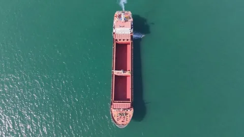 Aerial Top View Of Cargo Ship Sailing Through Calm Sea Видео 331234716