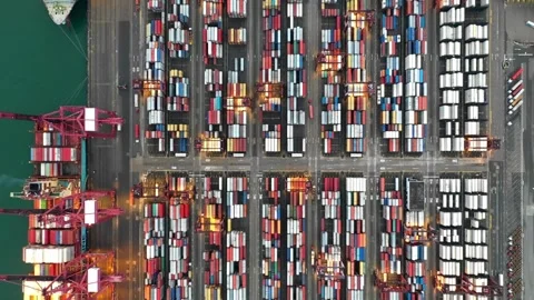 Aerial top view cargo ship or oil tanker docking in sea port with warehouse 스톡 동영상 336445815