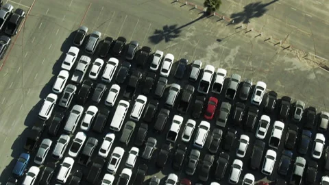 Aerial Top View Of Cars At Parking Lot On Sunny Day, Drone Flying Forward Over Stock Footage