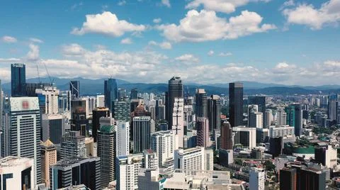 AERIAL. Top view of Center modern city. Kuala Lumpur skyline video. Stock Photos