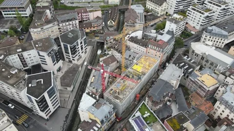 Aerial top view of construction site in dense urban area Montreux Switzerland Stock-Footage 332632437