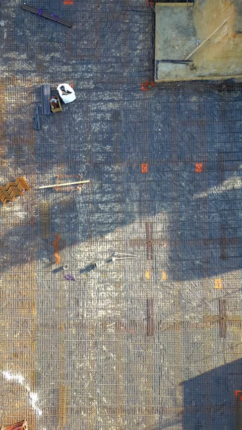 Aerial Top View of Construction Site Foundation with Rebar Grid Pulling Out Vídeos de archivo 333179271