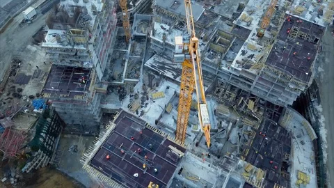 Aerial top view of construction worker work on building at construction site Stock Footage 98788300