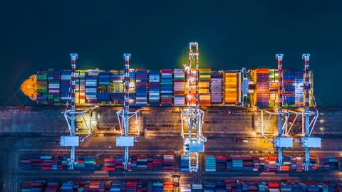 Aerial top view container cargo ship working at night, Timelapse. Vidéo 90895185
