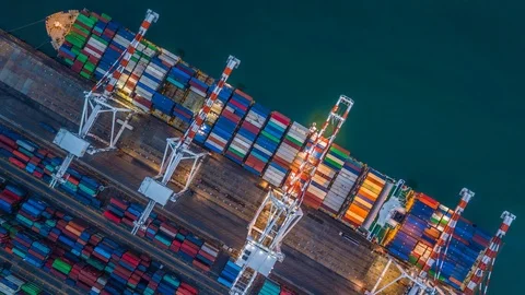 Aerial top view container cargo ship working at night, Time lapse. Stock Footage 90895398