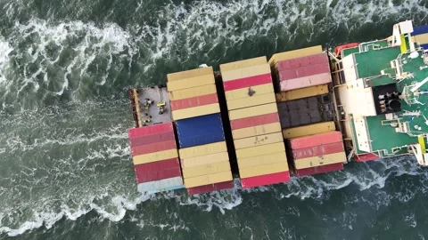 Aerial Top View of Container Ship Transporting Cargo Across the Ocean Stock-Footage 327972151