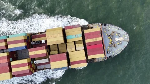 Aerial Top View of Container Ship Transporting Cargo Across the Ocean Stock Footage 327972301