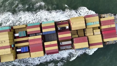 Aerial Top View of Container Ship Transporting Cargo Across the Ocean Video stock 327972346