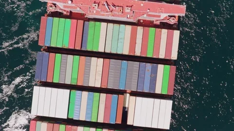 Aerial top view of a container ship sailing on the open sea Stock Footage 337705656