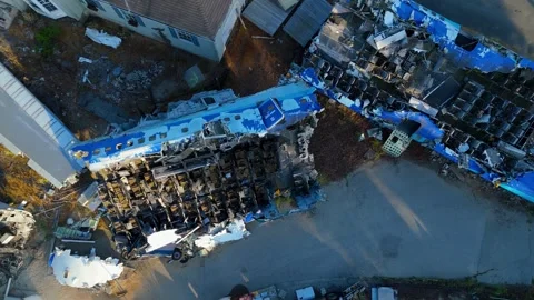 Aerial top view of crashed airplane set at Universal Studios Hollywood, June 22 Stock Footage 318490633