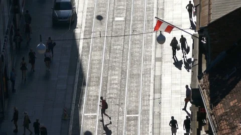 Aerial top view of crowd of unrecognizable people walking in street with shadows Stock Footage 89148265