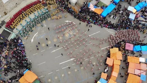 Aerial Top View Of A Dancing Procession And Audience On Oruro Carnival, Bolivia Stock Footage 191776423