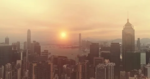 AERIAL. Top view of dramatic sunset sky over Hong Kong panoramic view. Stock Footage 89958756
