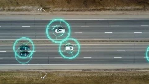 Aerial top view of driverless or autonomous cars driving on highway. Traffic Stock Footage 151506648