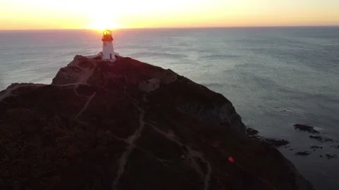 Aerial Top View A Drone Of Lighthouse In Sunshine on Cape Bryner, 4K 動画素材 220533691