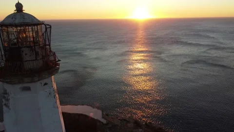 Aerial Top View A Drone Of Lighthouse In Sunshine on Cape Bryner, 4K Stock-Footage 220533710