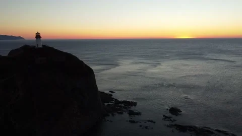 Aerial Top View A Drone Of Lighthouse In Sunshine on Cape Bryner, 4K 動画素材 220533714