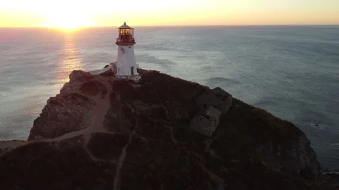 Aerial Top View A Drone Of Lighthouse In Sunshine on Cape Bryner, 4K 動画素材 220533742