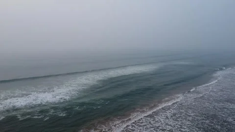 Aerial top view drone video clip of scenic wave formation in a sea beach Video stock 328100613