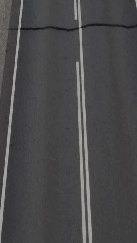 Aerial top view of empty Chuysky Trakt highway asphalt with road markings Stock Footage 335662764