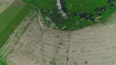 Aerial top view of empty field after harvers. 4K. Stock Footage 113204883