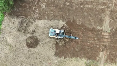 Aerial top view of excavator working on construction site Stock Footage 327691677