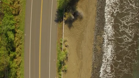 Aerial Top View Fly Over Coastal Desolated Empty Road Maui Waves and Rocks Stock Footage