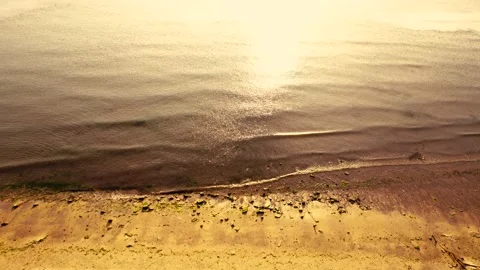 Aerial Top View from Flying Drone in The Sea at Sunset Stock Footage 155492239