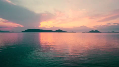 Aerial Top View from Flying Drone, Sea and Waves at Sunset in Summer Stock Footage 155657995