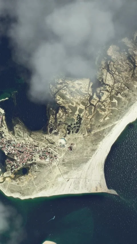 Aerial top view flying over the clouds of Faro City in Portugal. Portugal Video stock 283420864