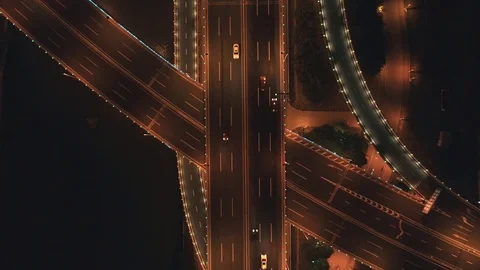 Aerial top view of highway interchange at night. Aerial top view of road Видео 111450960
