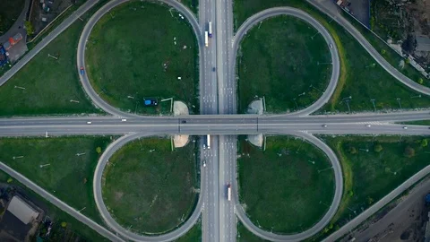 Aerial top view at highway intersection or road junction with circle movement Stock Footage 107873515