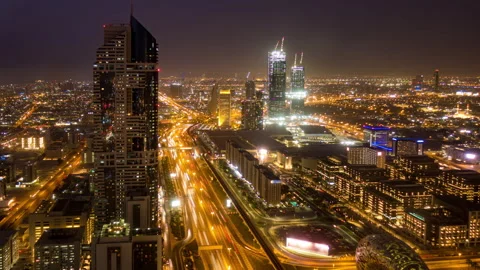 Aerial top view of highway junction with traffic timelapse in Dubai, UAE at Stock Footage 158297614