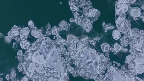 AERIAL: Top view of an ice drift on a freezing river. Stock Footage 83816189