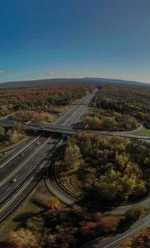 Aerial top view of the intersection of highways in Germany. Vertical panorama Stock Photos