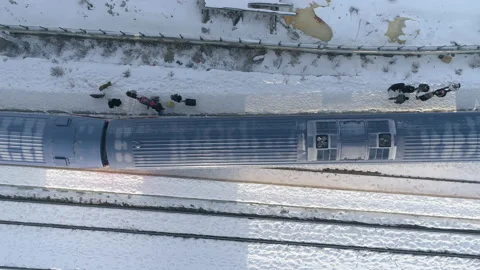 Aerial top view of Kars Train Station and Passengers in Turkey Stock Footage 144085053