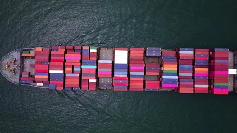 Aerial top view of a large cargo container ship sailing in the ocean Stock Footage 332870070