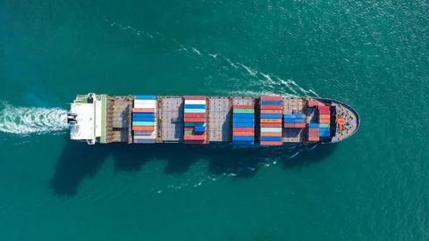 Aerial top view of Large container cargo ship in export and import business.. Stock Photos