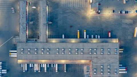 Aerial top view of the large logistics park with warehouse, semi-trailers trucks Vídeos de archivo 116510544